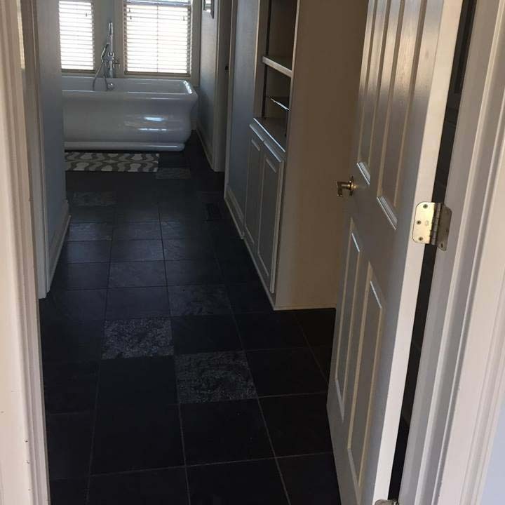 Hallway bathroom with clean tile floor